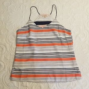 SKIES ARE BLUE

Auset Cutout Cami Blouse

Size: M